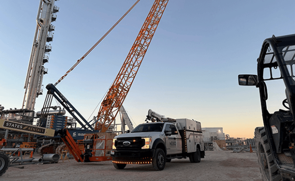 MESO Truck on Jobsite Next to Crane